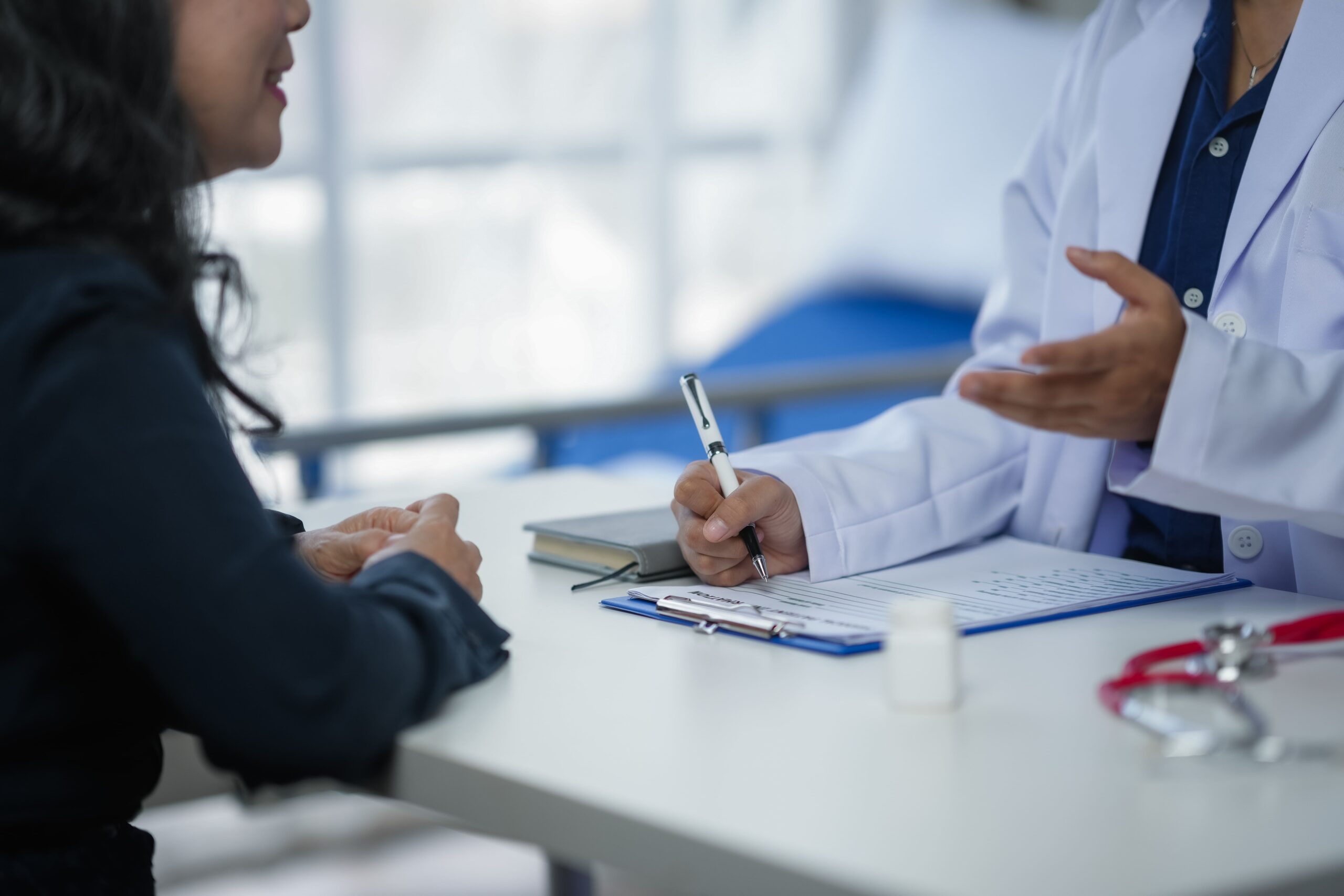 Image doctor consulting patient in a clinic discussing 2025 03 09 07 58 36 utc.jpg