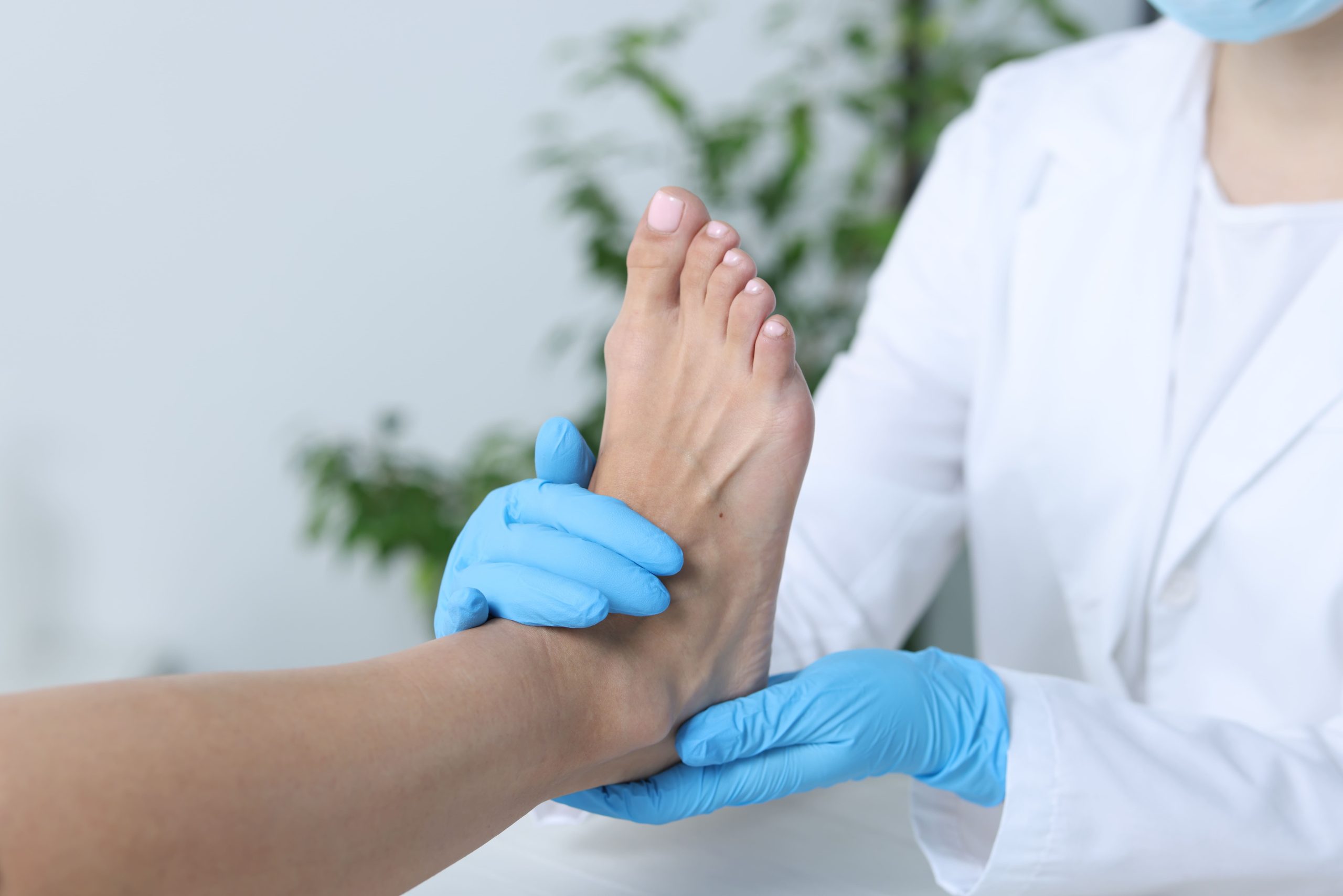 Image doctor examining patient s foot in hospital close 2026 01 11 11 10 11 utc (1)