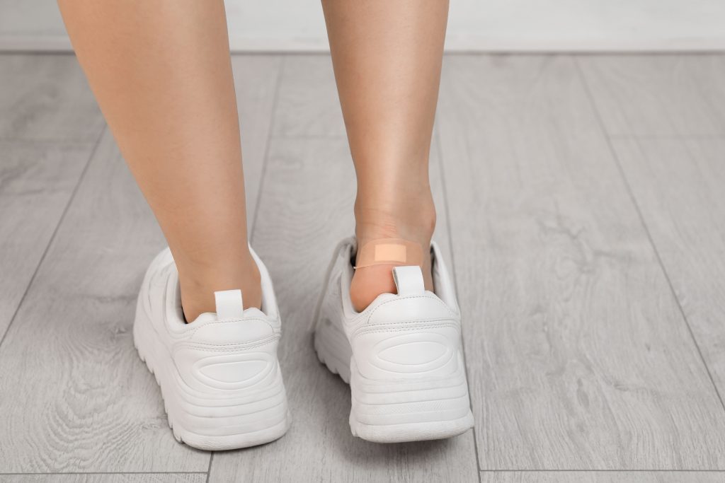Image female with plastered heel on wooden floor closeu 2026 03 24 22 18 45 utc (1)