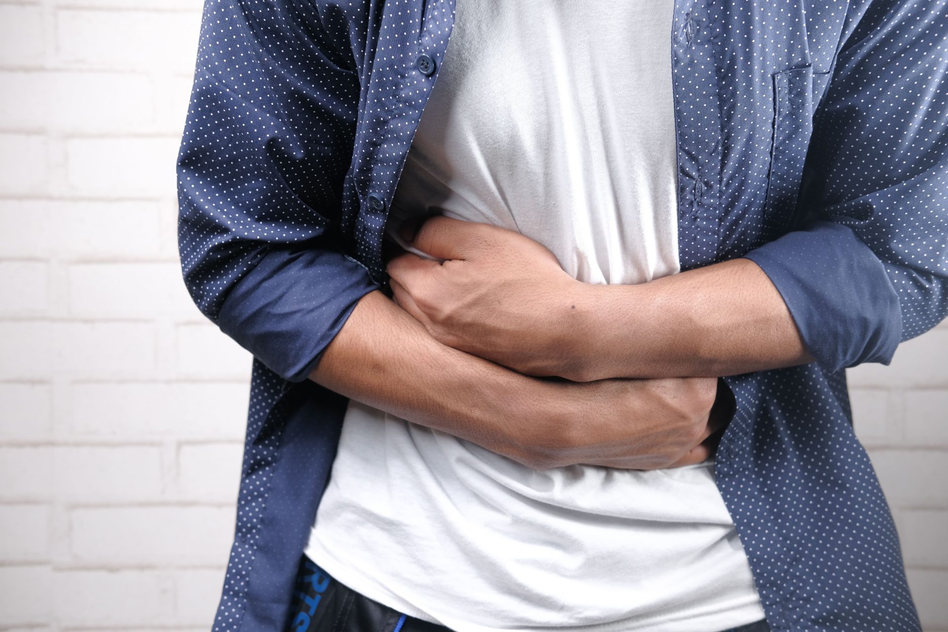 Image young man suffering stomach pain close up 2026 03 17 03 34 57 utc 1.jpg